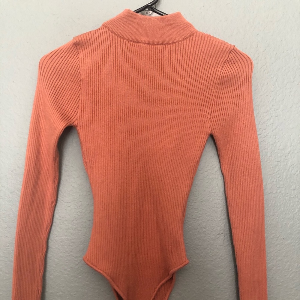 Salmon colored bodysuit